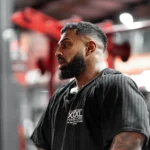 Explosive Fibres Classic XXXL Logo Old School Jumbo Rib Ragtop Black being worn in a gym