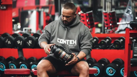 Conteh Carbdrive Mango 1.12 kg tub - man in gym image - carbohydrate drink - intra workout supplement