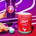 Alani NU Pre-Workout + Cherry Slush Flavour- Lifestyle Image